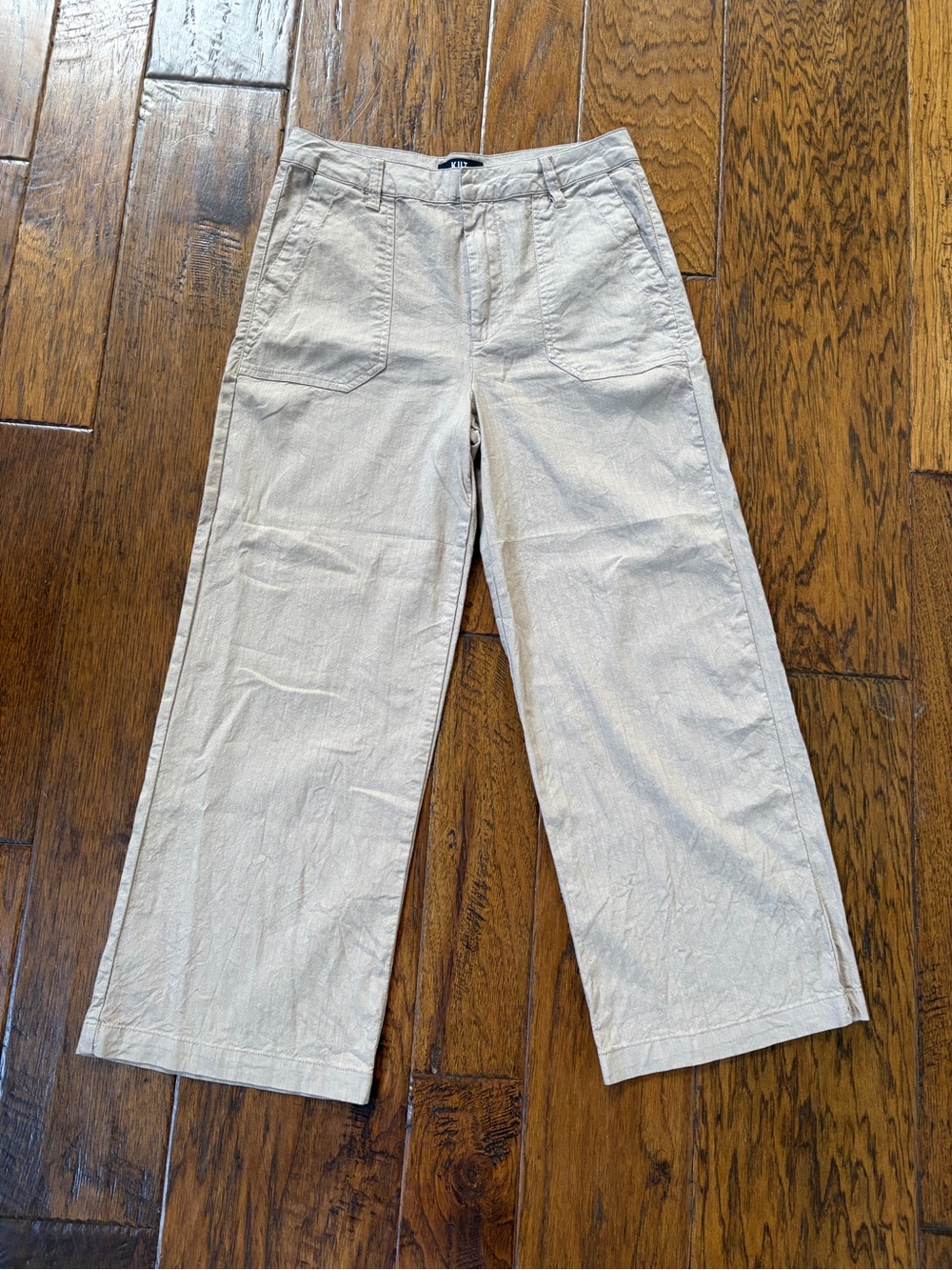 Kut from the Kloth Wide-Leg Chinos in Tan. Crop inseam 25.5